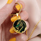 Woman holding an Elegant gold pendant Chinese Dragon necklace featuring a vivid Jade dragon with stars and clouds set against a black backdrop. This jewelry offers personalization with an engraving option for a name.