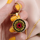 Woman holding An Elegant gold pendant featuring a Vintage Design with a vivid Red Star of David Necklace, set against a gold and black backdrop. This jewelry offers personalization with an engraving option for a name.