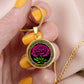 Woman holding an Elegant January gold pendant Celtic Carnation Birth Flower necklace featuring a vivid pink, green flower, set against a gold & black backdrop. This jewelry offers personalization with an engraving option for a name.