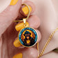 Gold Monkey Necklace in a woman's hand