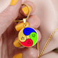 4 Elements Necklace in a woman's hand