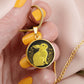 Woman holding an Elegant gold pendant Rabbit Necklace. Yellow Rabbit and Flowers with a black and brown backdrop. This jewelry offers personalization with an engraving option for a name.