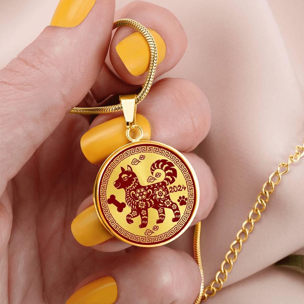 Woman holding a gold dog necklace