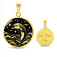 an Elegant gold pendant featuring a vivid gold Dolphin Necklace with a Stars and Ocean Waves set against a gold and black backdrop. This jewelry offers personalization with an engraving option for a name.