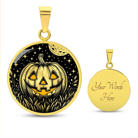 An elegant Gold pendant Jack O Lantern Necklace. The colors are gold and black. This jewelry offers personalization with an engraving option for a name.