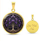 an elegant gold pendant Larkspur Tree of Life Necklace. The Colors are purple, green and brown. This jewelry offers personalization with an engraving option for a name.