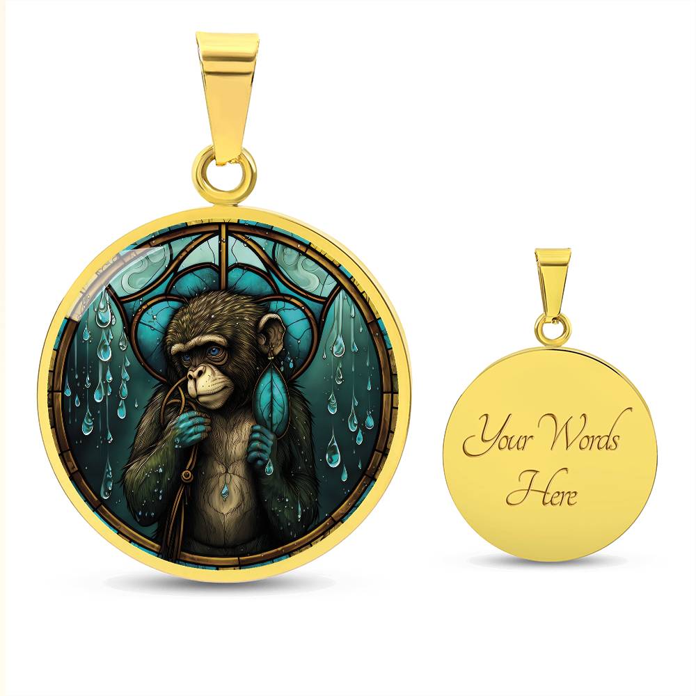 An elegant gold pendant Chinese Zodiac Monkey Necklace. The colors are yellow, blue, teal, brown and green. This jewelry offers personalization with an engraving option for a name.