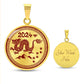 Elegant gold pendant necklace featuring a vivid red Dragon, set against a gold backdrop. This jewelry offers personalization with an engraving option for a name.