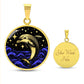 an Elegant gold pendant featuring a vivid gold Dolphin Necklace with a Stars and Ocean Waves set against a gold and black backdrop. This jewelry offers personalization with an engraving option for a name.