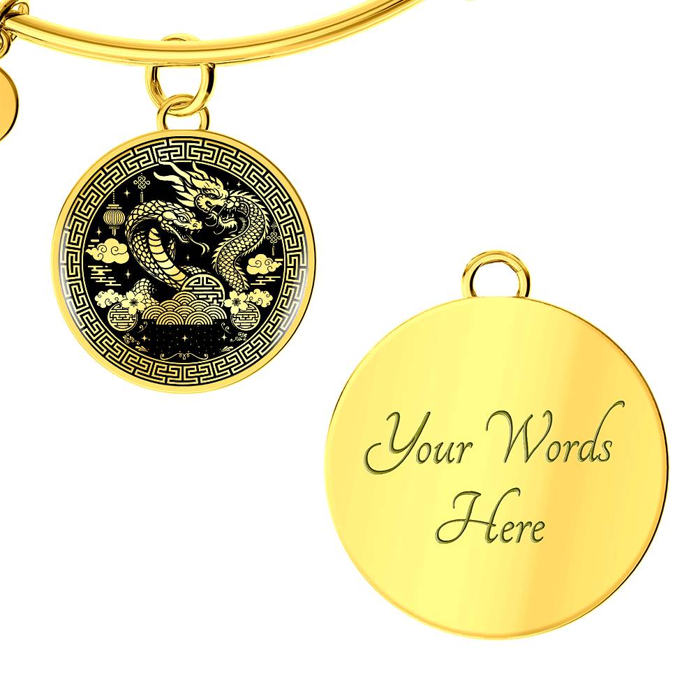 An Elegant gold Year of the Dragon and Snake Bracelet. The colors are gold and black. This bangle bracelet & pendant has an engraving option for a personalization.