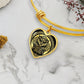 an elegant gold pendant Celtic Owl Bracelet. Colors are gold and black. This jewelry offers personalization with an engraving option for a name.