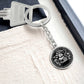 This Year of the dragon keychain. Elegant silver pendant with a rabbit & dragon, is set against a silver backdrop. This jewelry offers personalization with an engraving option for a name.