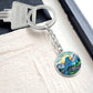 An elegant silver pendant Bluebird Necklace. The colors are blue, green,  brown and yellow. This jewelry offers personalization with an engraving option for a name.