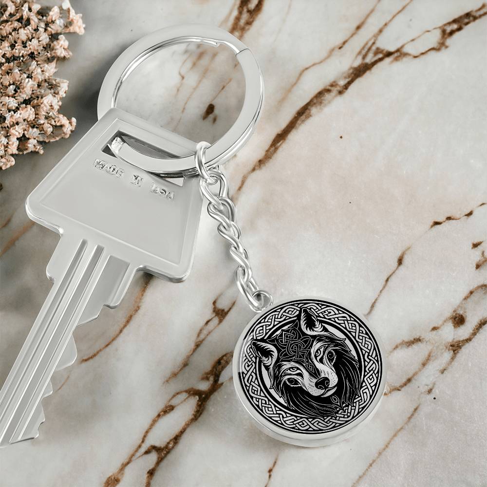 An Elegant silver pendant Celtic Wolf Keychain with a silver and Black background. This jewelry offers personalization with an engraving option for a name.