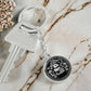 This Year of the dragon keychain. Elegant silver pendant with a rabbit & dragon, is set against a silver backdrop. This jewelry offers personalization with an engraving option for a name.