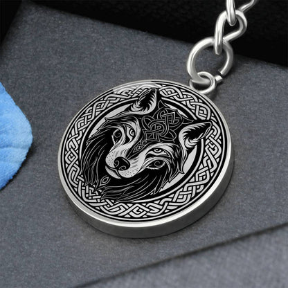 An Elegant silver pendant Celtic Wolf Keychain with a silver and Black background. This jewelry offers personalization with an engraving option for a name.