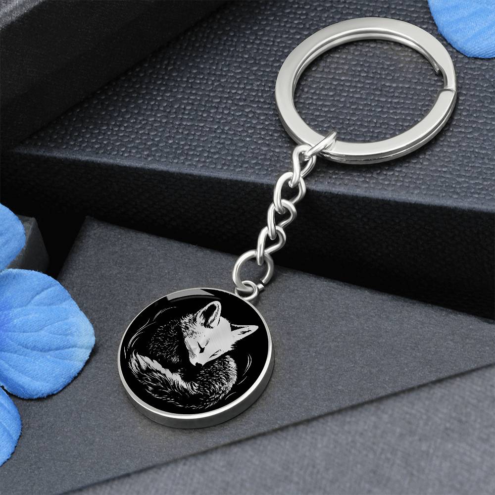 Elegant Silver pendant featuring a Personalized Fox Keychain, With a silver Fox Set against a black background. This jewelry offers Customization with an engraving option for a name.