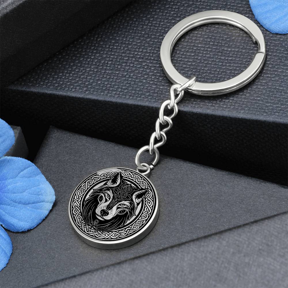 An Elegant silver pendant Celtic Wolf Keychain with a silver and Black background. This jewelry offers personalization with an engraving option for a name.