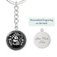 This Year of the dragon keychain. Elegant silver pendant with a rabbit & dragon, is set against a silver backdrop. This jewelry offers personalization with an engraving option for a name.
