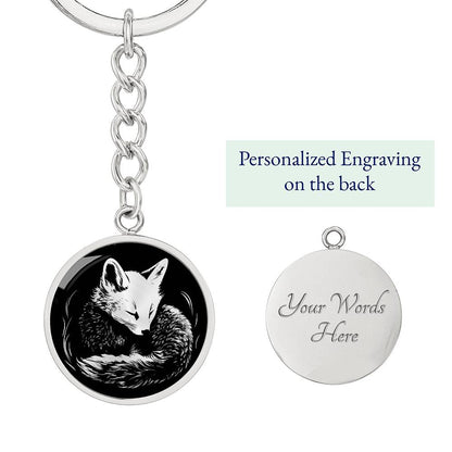 Elegant Silver pendant featuring a Personalized Fox Keychain, With a silver Fox Set against a black background. This jewelry offers Customization with an engraving option for a name.