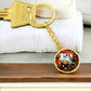 An elegant gold pendant Halloween Ghost Keychain. The colors are white, black, yellow, orange and green. This jewelry offers personalization with an engraving option for a name.