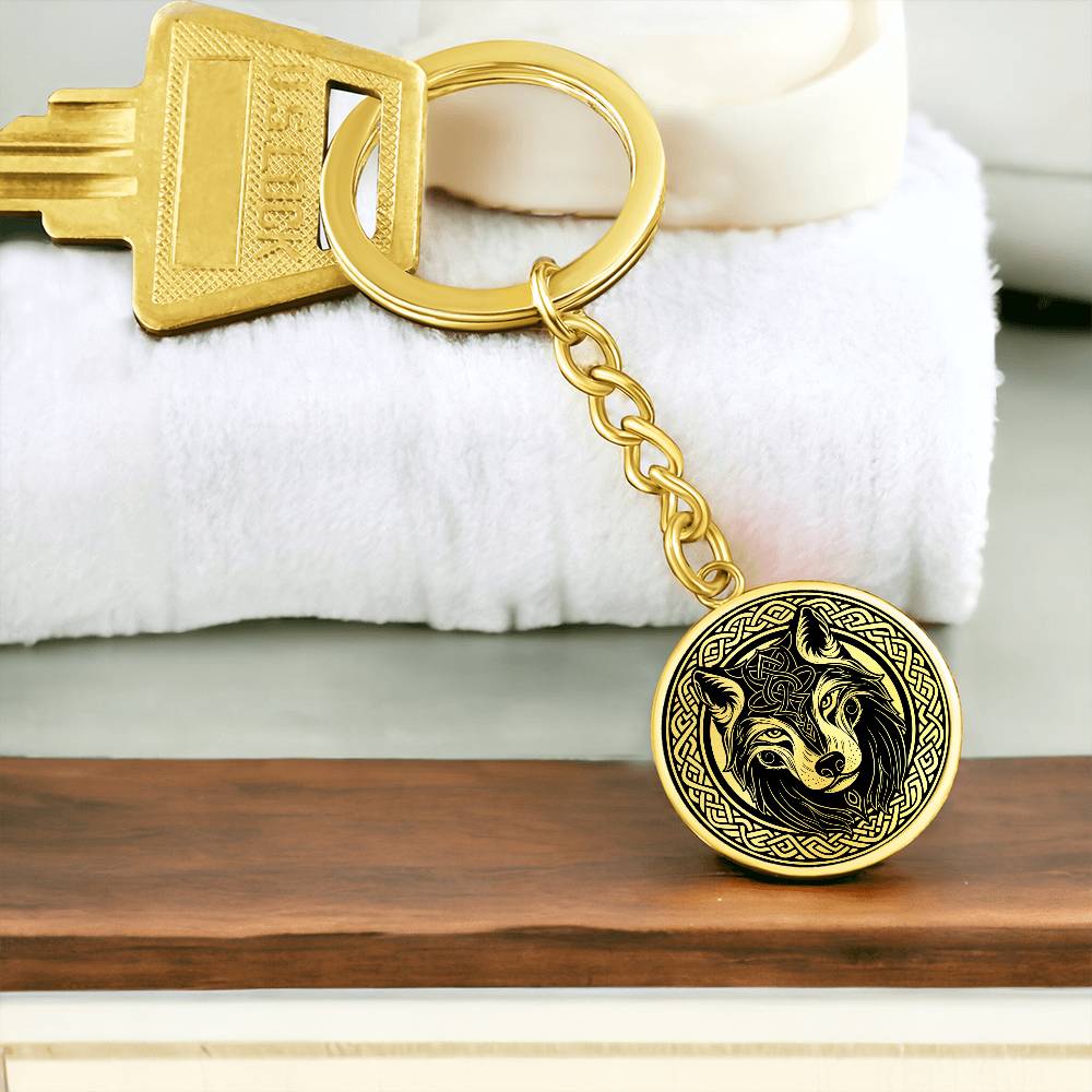 An Elegant Gold pendant Celtic Wolf Keychain with a Gold and Black background. This jewelry offers personalization with an engraving option for a name.