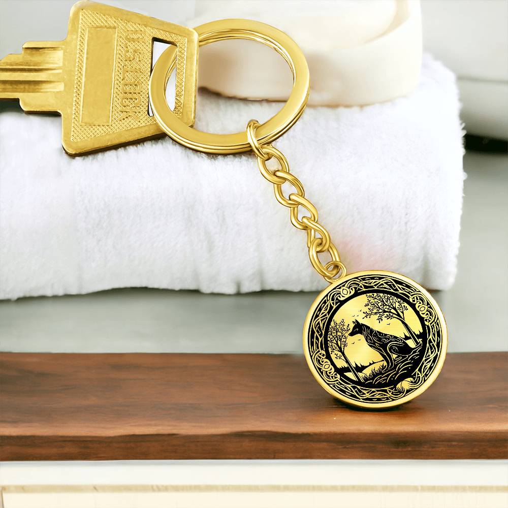 An Elegant Gold pendant Celtic Wolf Keychain with a Gold and Black background. This jewelry offers personalization with an engraving option for a name.