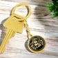 This Year of the dragon keychain. Elegant gold pendant with a rabbit & dragon, is set against a gold backdrop. This jewelry offers personalization with an engraving option for a name.