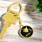 an Elegant Gold pendant featuring a Personalized Fox Keychain, With a gold Fox Set against a black background. This jewelry offers Customization with an engraving option for a name.