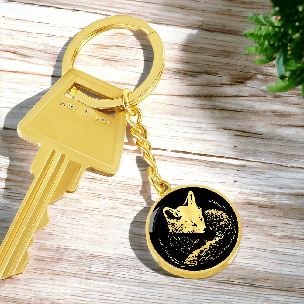 an Elegant Gold pendant featuring a Personalized Fox Keychain, With a gold Fox Set against a black background. This jewelry offers Customization with an engraving option for a name.