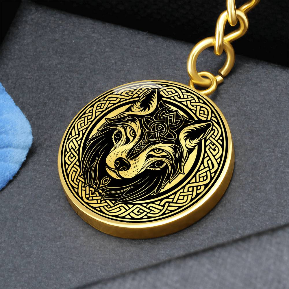 An Elegant Gold pendant Celtic Wolf Keychain with a Gold and Black background. This jewelry offers personalization with an engraving option for a name.